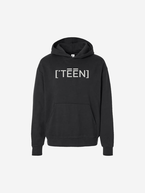 A black hoodie with the bold text "[‘TĒĒN]" in white, minimalist design, featuring a pullover style.