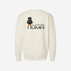 A bone colored crewneck sweatshirt designed with the ['TEEN] logo in black for a classic and casual everyday look.