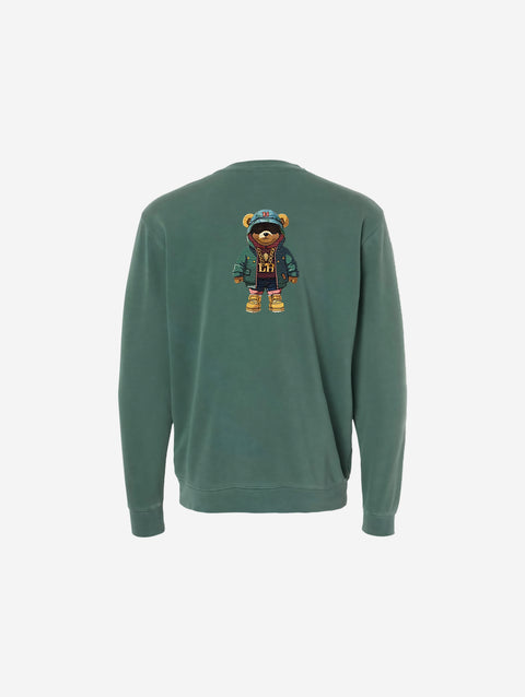 Pigment-dyed crewneck sweatshirt in alpine green showcasing the understated 'HŪMN' logo, perfect for adding a subtle pop of color to a laid-back wardrobe.
