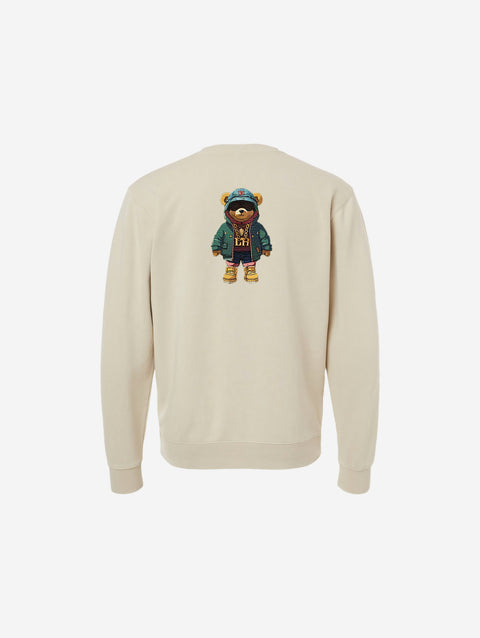 Pigment-dyed crewneck sweatshirt in ivory with the signature 'HŪMN' logo, blending a neutral tone with a relaxed and casual design for everyday wear.