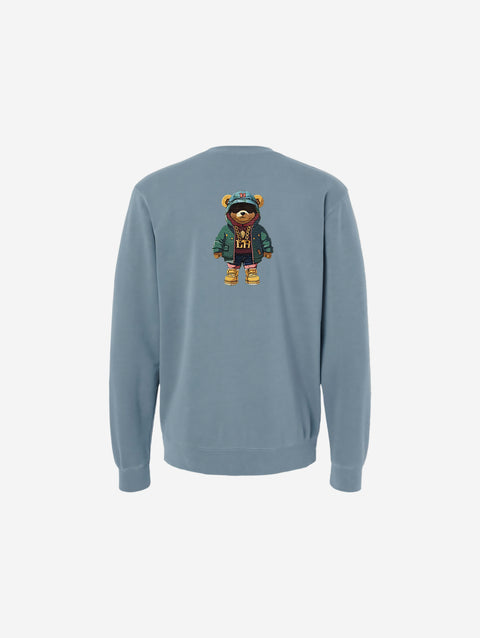 A muted stone blue pigment-dyed crewneck sweatshirt with the simple 'FLIP THE HŪMN' logo. A cool and casual choice for everyday comfort.