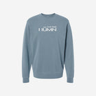 A muted stone blue pigment-dyed crewneck sweatshirt with the simple 'FLIP THE HŪMN' logo. A cool and casual choice for everyday comfort.