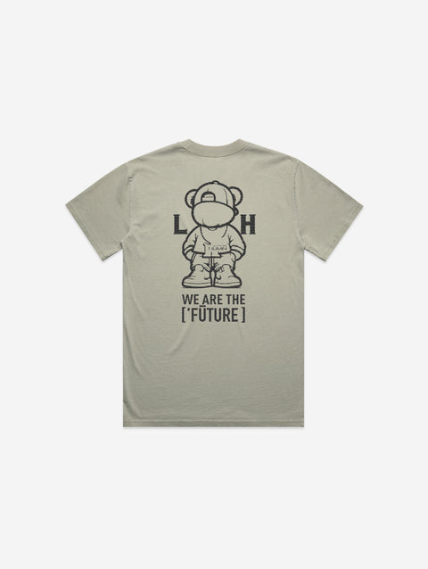 Green heavy faded tee with '[LIT·TLE] Life' printed on the chest, featuring a relaxed fit and subtle earthy tone.