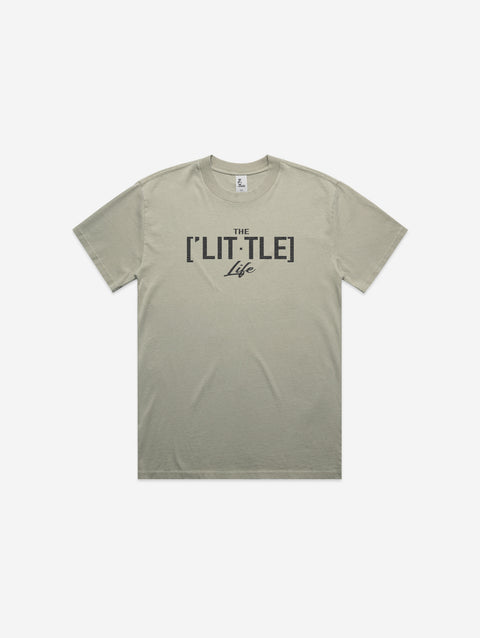 Green heavy faded tee with '[LIT·TLE] Life' printed on the chest, featuring a relaxed fit and subtle earthy tone.