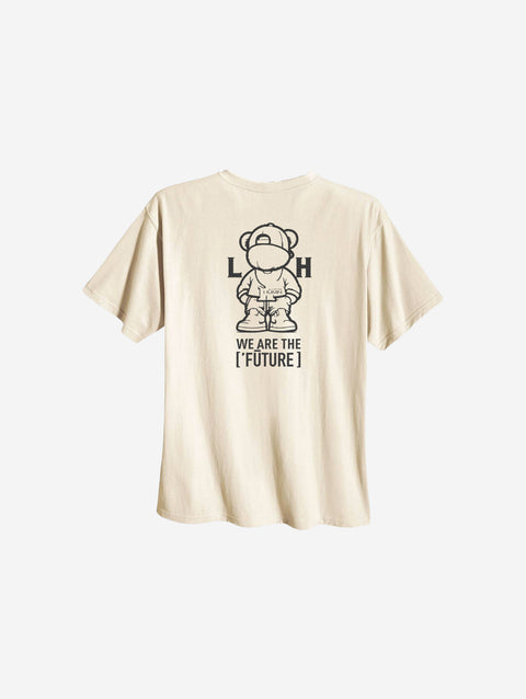 A bone-colored t-shirt showcasing the '[LITTLE]' logo on the left chest in a clean design.