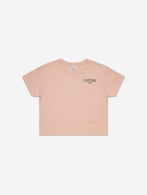 A pastel pink cropped T-shirt with a minimalist "['LIT·TLE] Life" logo on the left chest.