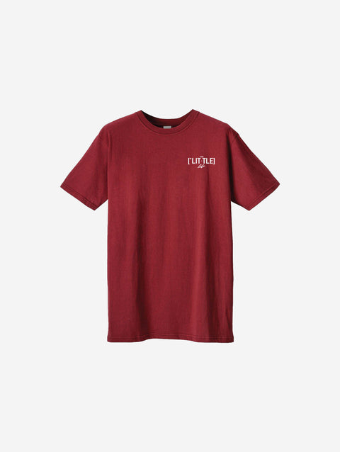 A bold red t-shirt featuring the '[LITTLE]' logo on the left chest.