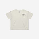 A bone-colored cropped T-shirt featuring the minimalist "['LIT·TLE] Life" logo on the left chest.