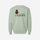 A muted sage green crewneck sweatshirt with the minimalist ['TEEN] logo in black, creating a calm and contemporary vibe.