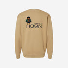 A soft sand-colored crewneck sweatshirt with a bold black ['TEEN] logo. Perfect for warm, earthy tones.
