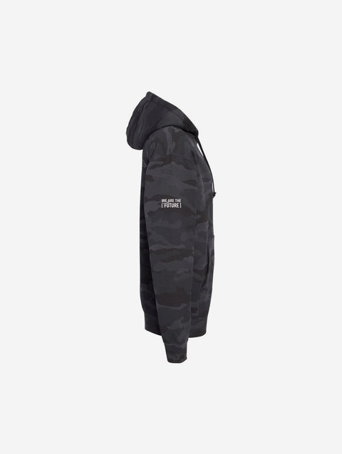 A black camouflage print hoodie with the text "[‘TEEN]" printed in bold white lettering across the chest. The design blends subtle camo tones with a sleek streetwear aesthetic.