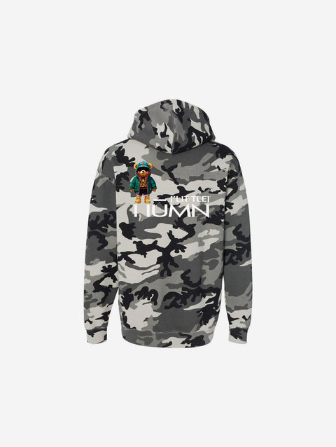 A gray and white snow camouflage print hoodie with "[‘TEEN]" printed in bold white text across the chest. This hoodie showcases a striking pattern perfect for a cool, edgy look.