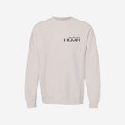A bone-colored heavyweight sweatshirt with the 'LITTLE HU' logo on the chest. Designed for a cozy yet sleek look, perfect for layering or standalone wear.